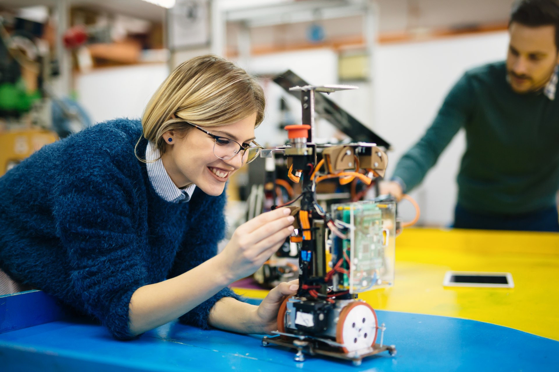 Woman testing robot